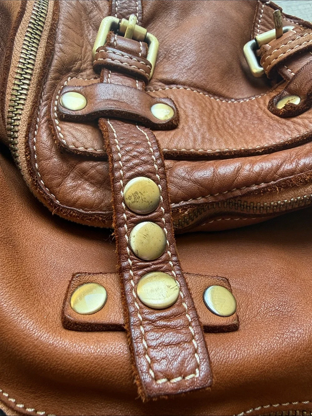 Lusher Stylish Tan Leather Backpack with Brass Accents